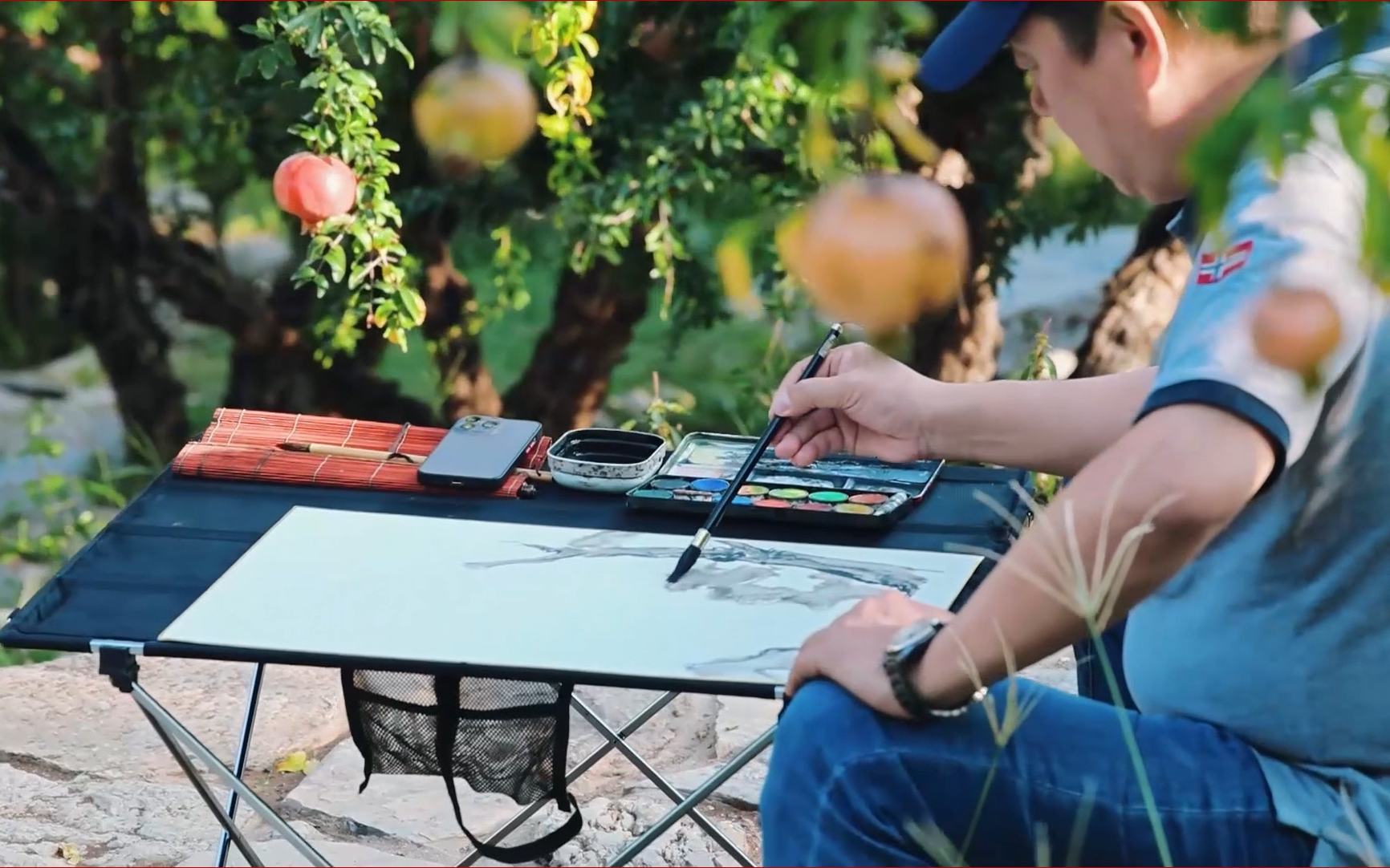 把石榴畫成“金山”